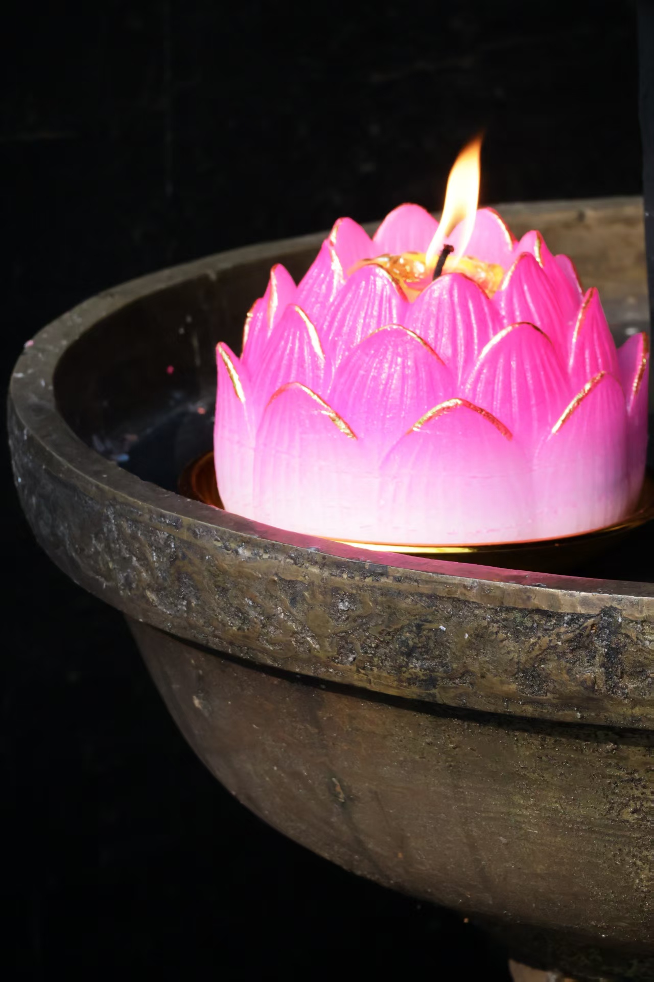 A glowing lotus installation at night in Beijing